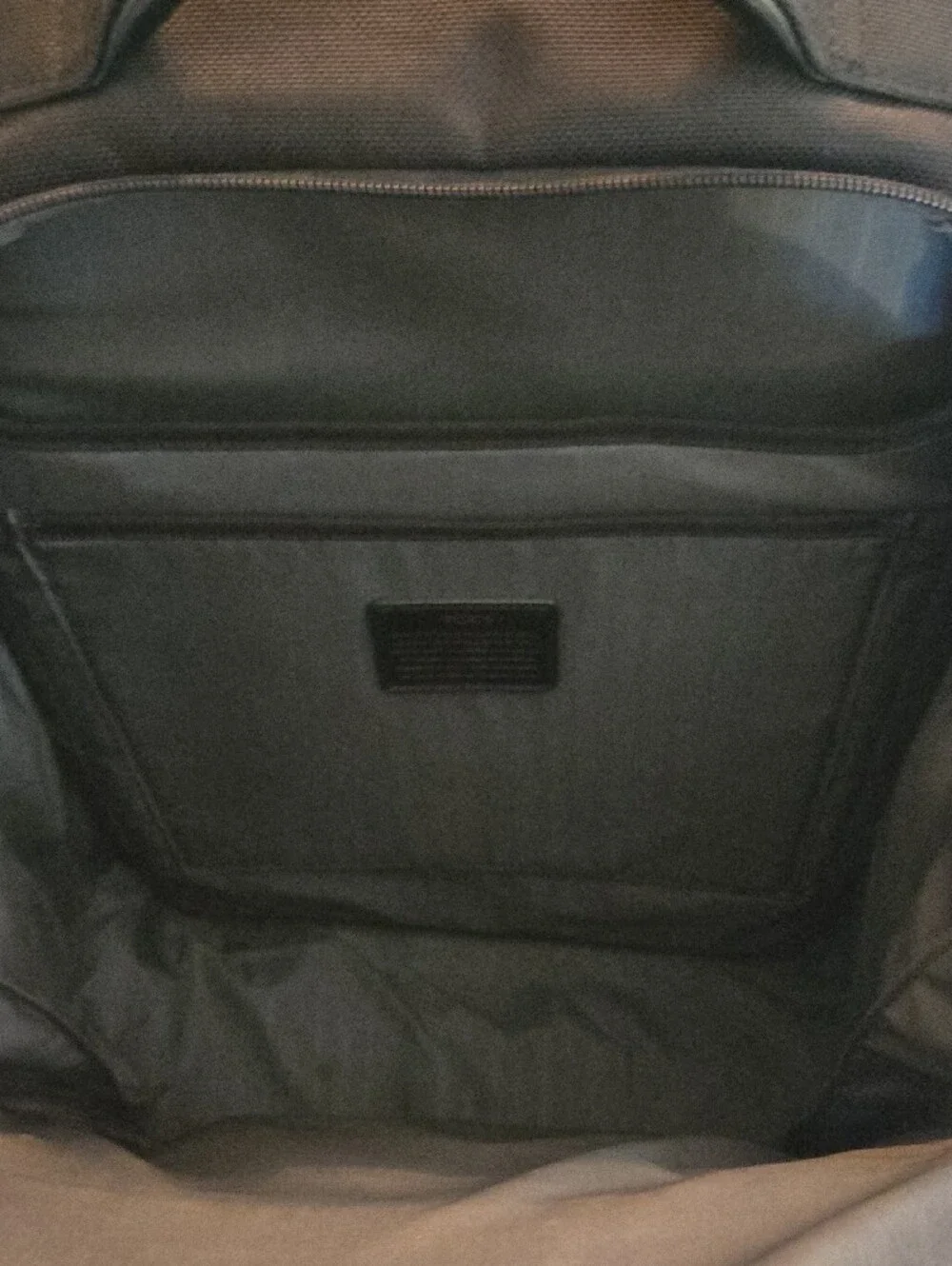Tumi Black Men's Backpack with Multiple Front Pockets